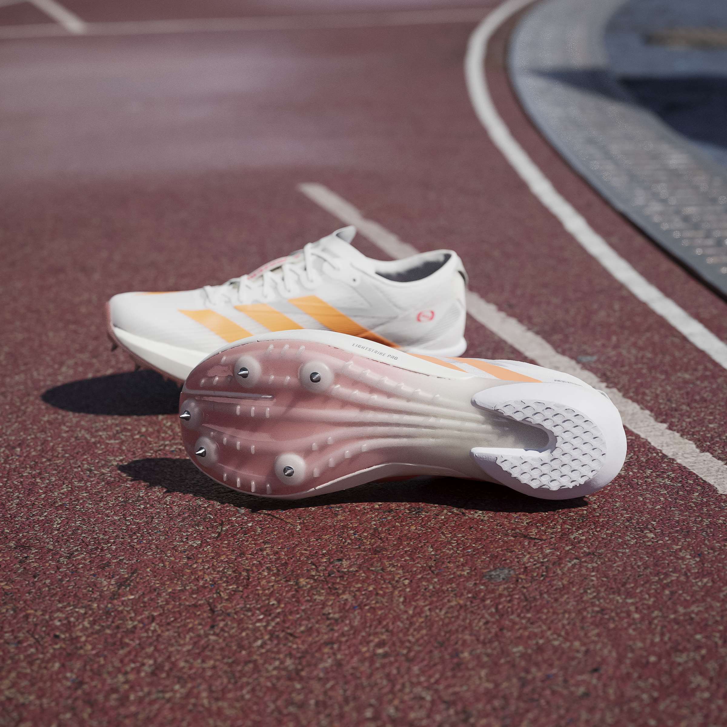 adidas Adizero Ambition Spikes | Cloud White / Lucid Orange / Lucid Red | Unisex - Ekiden Sports